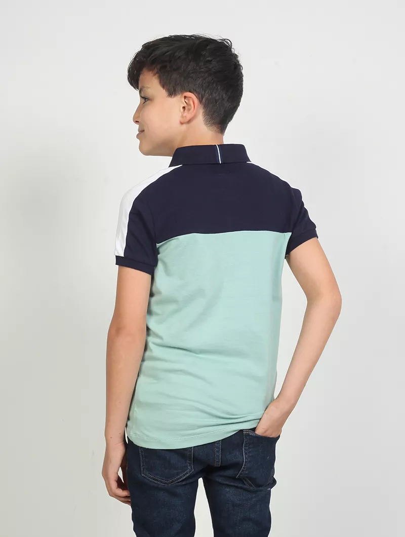 Polo garçon avec badge